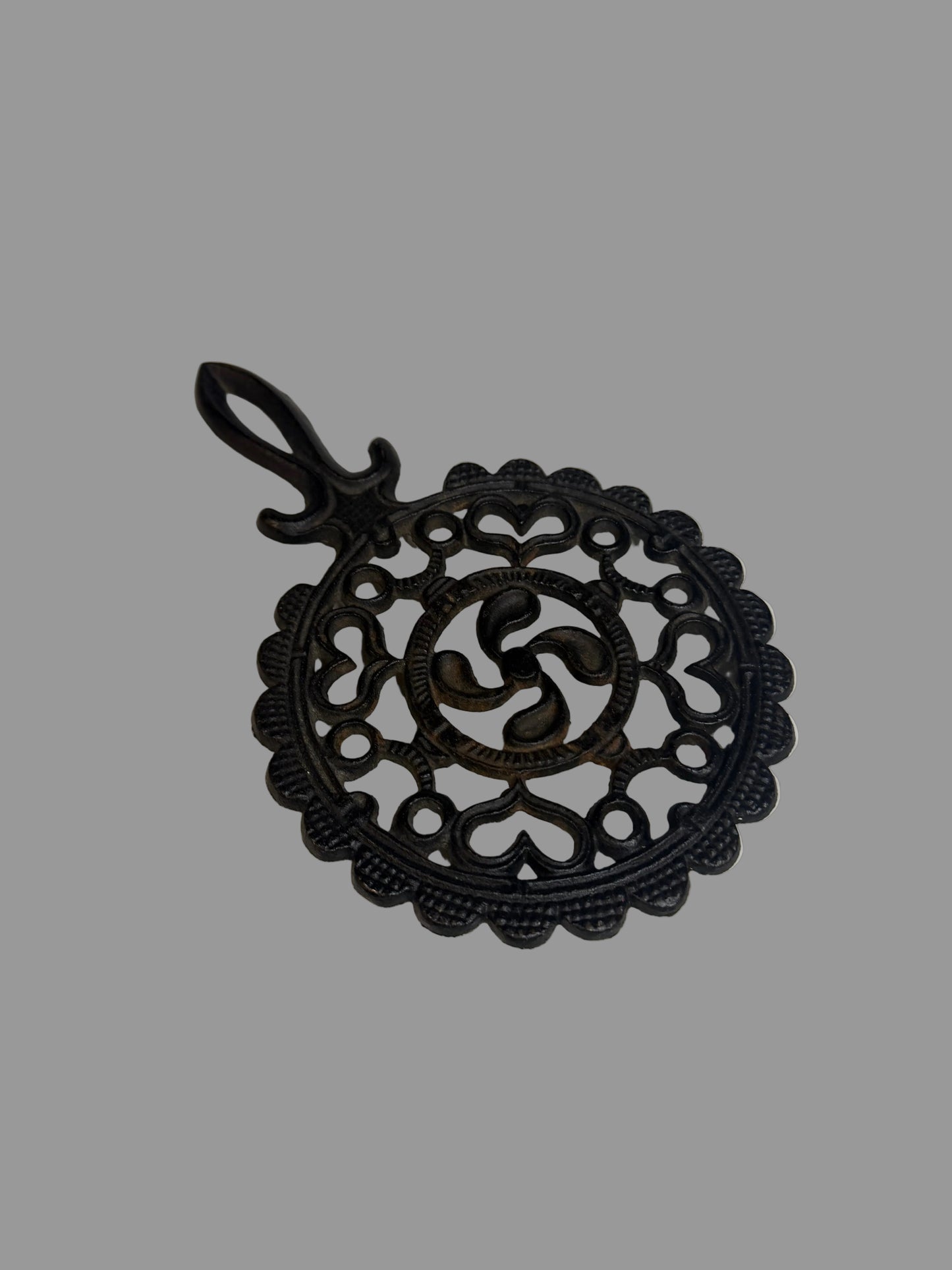 Vintage J.Z.H. Cast Iron Trivet (1952) – Heart & Spiral Design